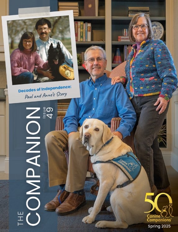 A magazine cover featuring a man sitting with a yellow Labrador service dog, alongside a woman standing next to him. The background has bookshelves and wooden furniture. A polaroid-style image above them shows a younger couple with a dog. The text on the cover includes "The Companion Issue 49" and "Decades of Independence: Paul and Anne's Story".